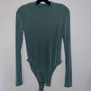 Forever 21 large teal bodysuit. Never worn